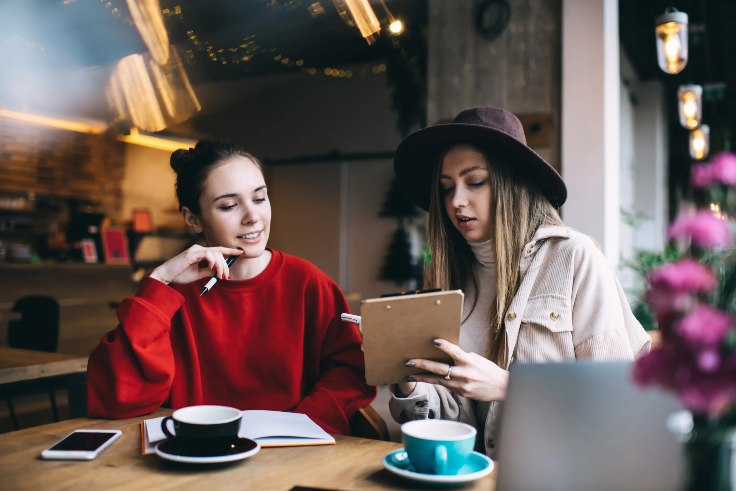 busy-friends-discussing-startup-in-cafe-2025-04-01-20-59-18-utc